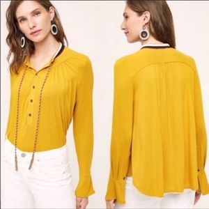 Anthro AKEMI + KIN mustard bell cuff tassels top